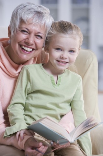 Grandmother Reading with Granddaughter The Unpaid Family Caregiver